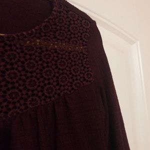 Plum blouse with threaded design on front
